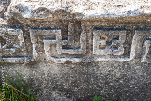 Swastika continuous ornament, carved on a Roman stone wall