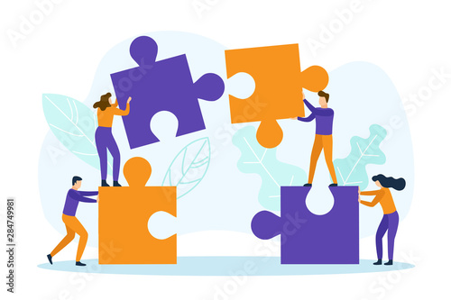 Business people with puzzle pieces