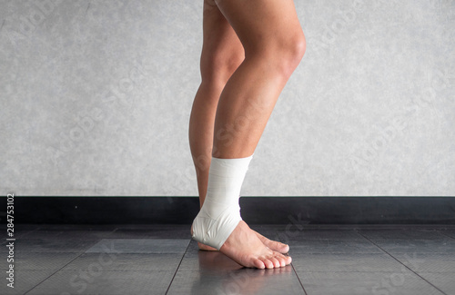 Athlete with a sprained ankle struggling to weight bear 