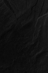Dark grey black slate background or texture.