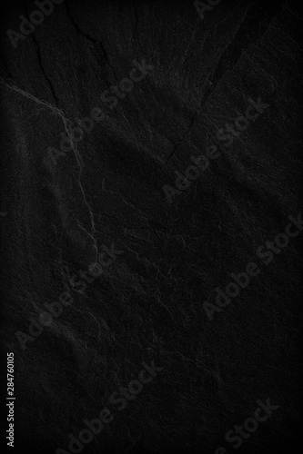 Dark grey black slate background or texture.