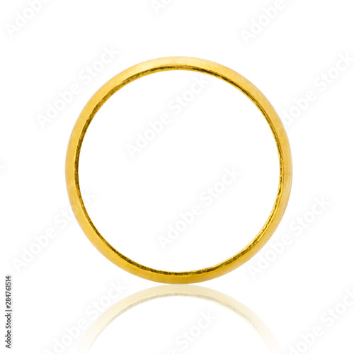 Closeup of gold ring for wedding isolated on white background.