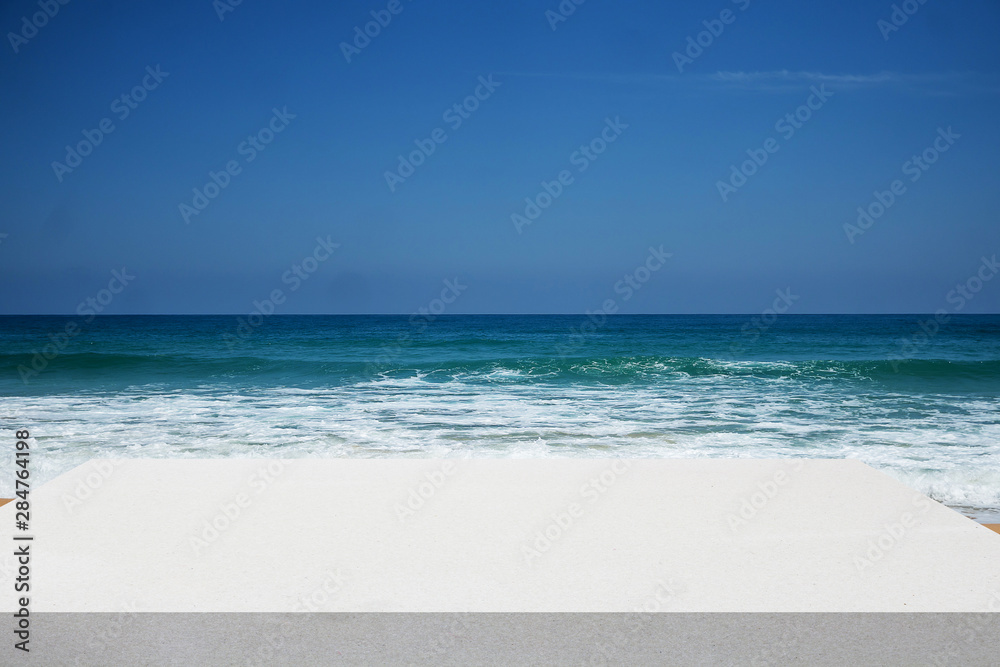White table with blue sky background White table with blue sky background