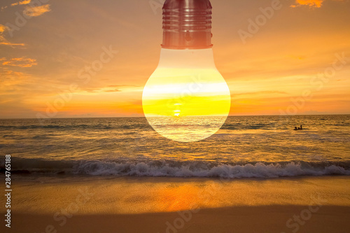 the abstract conceptual environment image the light bulb above sunset view