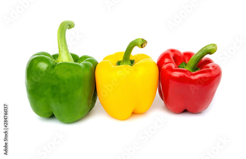 Red Yellow and Green peppers Three types isolated on white background
