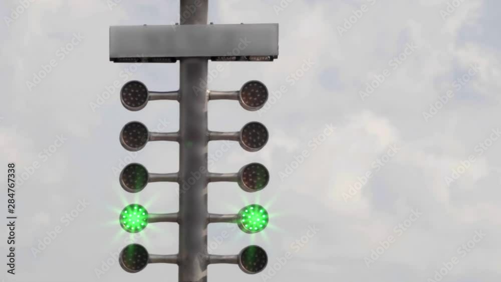 Drag racing street tree light. Stage lamp signal at quarter mile circuit.