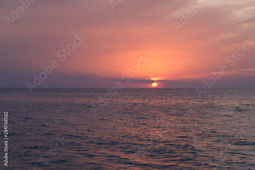 sunset over the sea © Mongkol