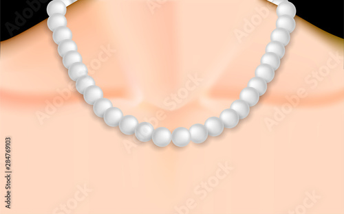 white pearl necklace on neck of women