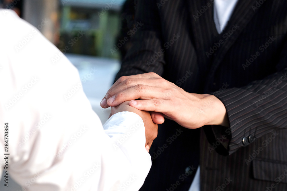 Obraz premium hand up of people working assemble corporate meeting show symbol Join forces teamwork quality and effective personnel Concept organizational development in teamwork and business