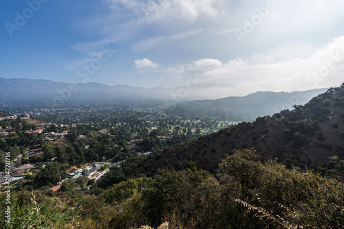 Hilltop view of Montrose and La Canada Flintridge with misty morning clouds in Los Angeles County California.