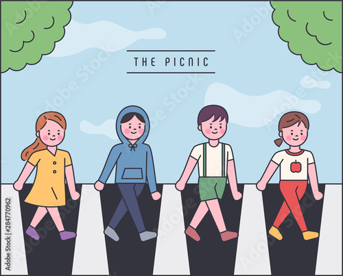 Tableau sur toile Cute people walking on the pedestrian crossing