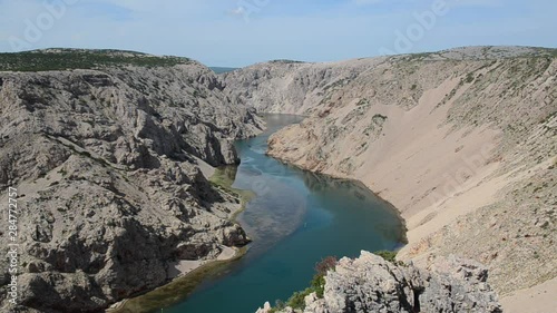 Zrmanja river canyon. Green river with crystal clear water in canyon. The river Zrmanja gorge. Beautiful Landscape in Croatia, Europe. photo