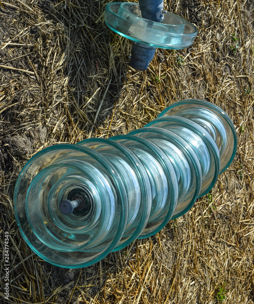 Fototapeta premium High-voltage insulators of glass insulators. Installation of high-voltage power lines