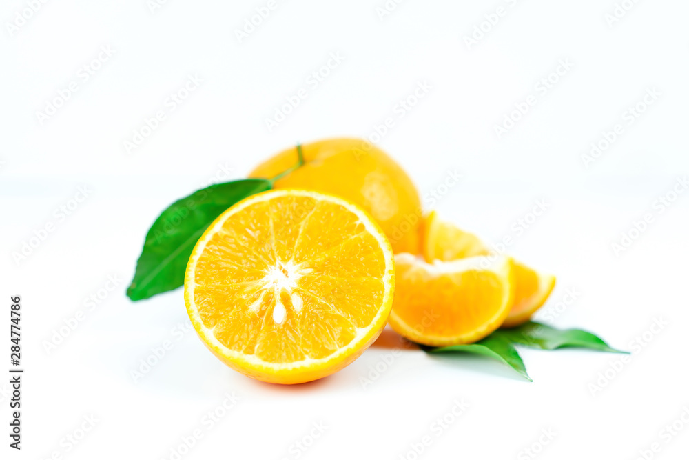 Orange fruits with leaf on isolated white background. Orange fruits with leaf on isolated white background.