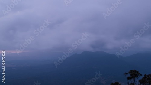 Timelapse of mist and fog rolling in over a valley in the mountains - Kanimbla Valley, Mount Blackheath photo