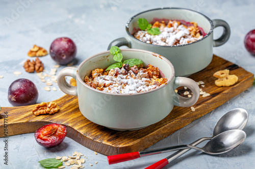 Crumble of red cherry plum, oatmeal and walnut.