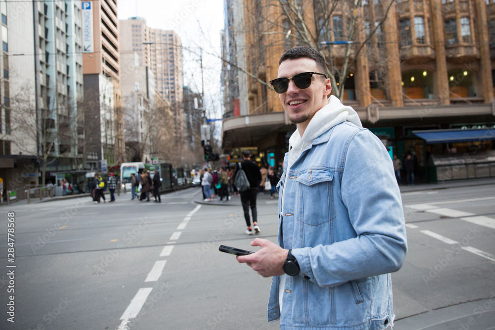 Male Tourist Exploring Melbourne on Foot Male Tourist Exploring Melbourne on Foot