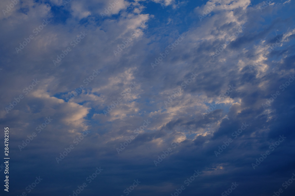 Clouds on the blue sky.