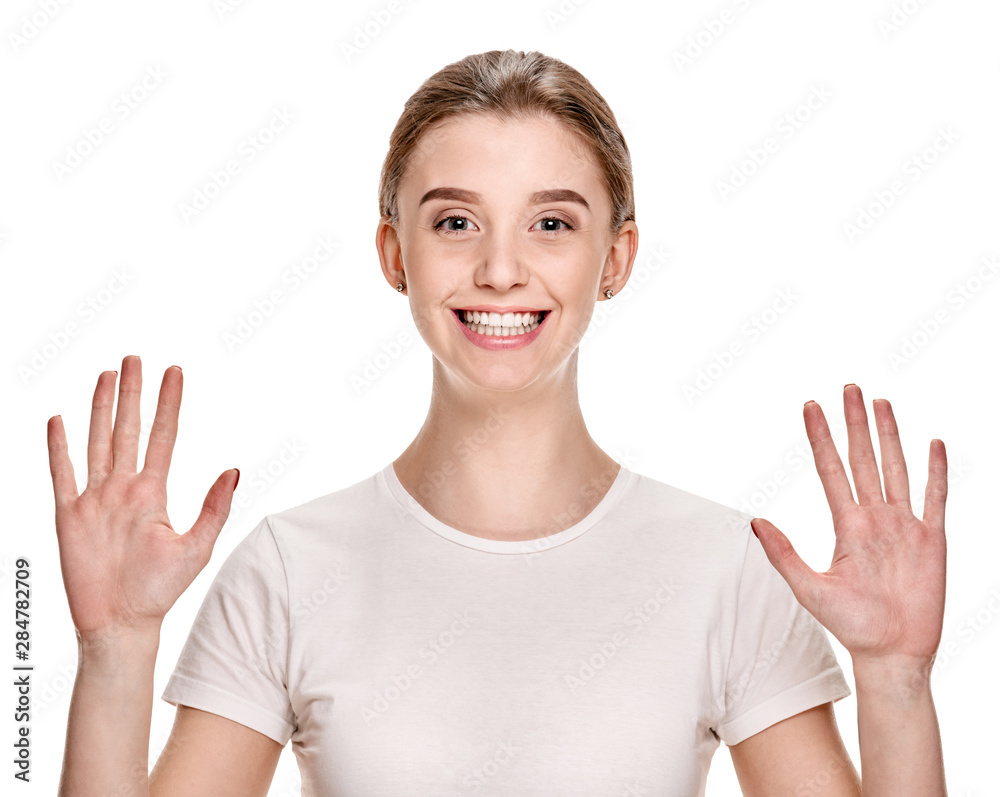 Happy cheerful excited girl showing two palms Happy cheerful excited girl showing two palms