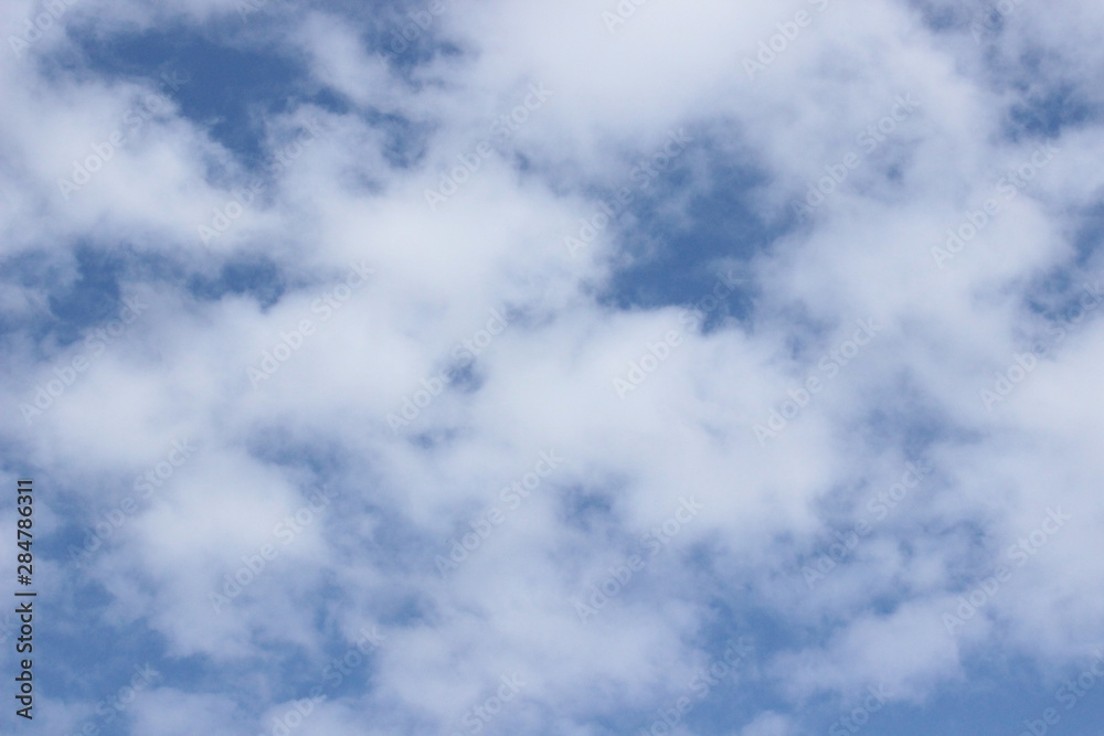 Beautiful clouds floating on the vast blue of the sky Beautiful clouds floating on the vast blue of the sky