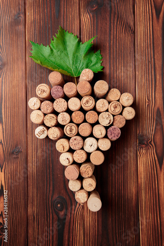 wine corks, grapevine, free copy space on wooden background ..