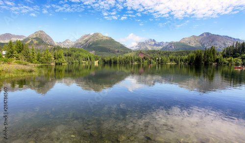 Reflection of mountain lake - Strbske pleso  Slovakia landscape