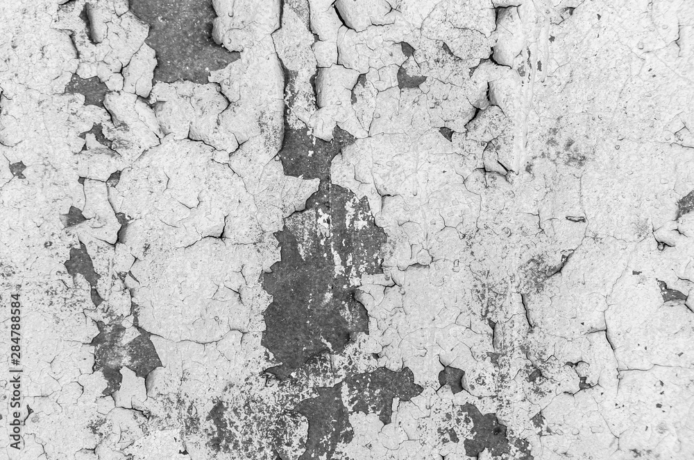 Obraz premium Old cracked paint on the concrete wall. Peeling paint on wall texture. Pattern of rustic blue grunge material
