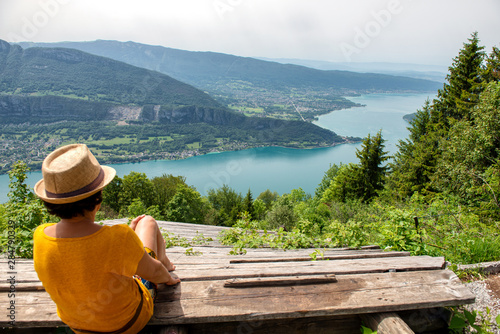 woman looking at the landscape of Lake Annecy