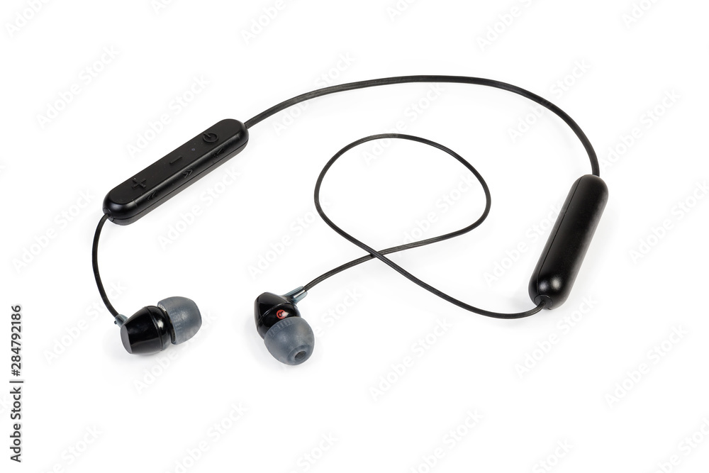 Black wireless earphones on a white background Black wireless earphones on a white background