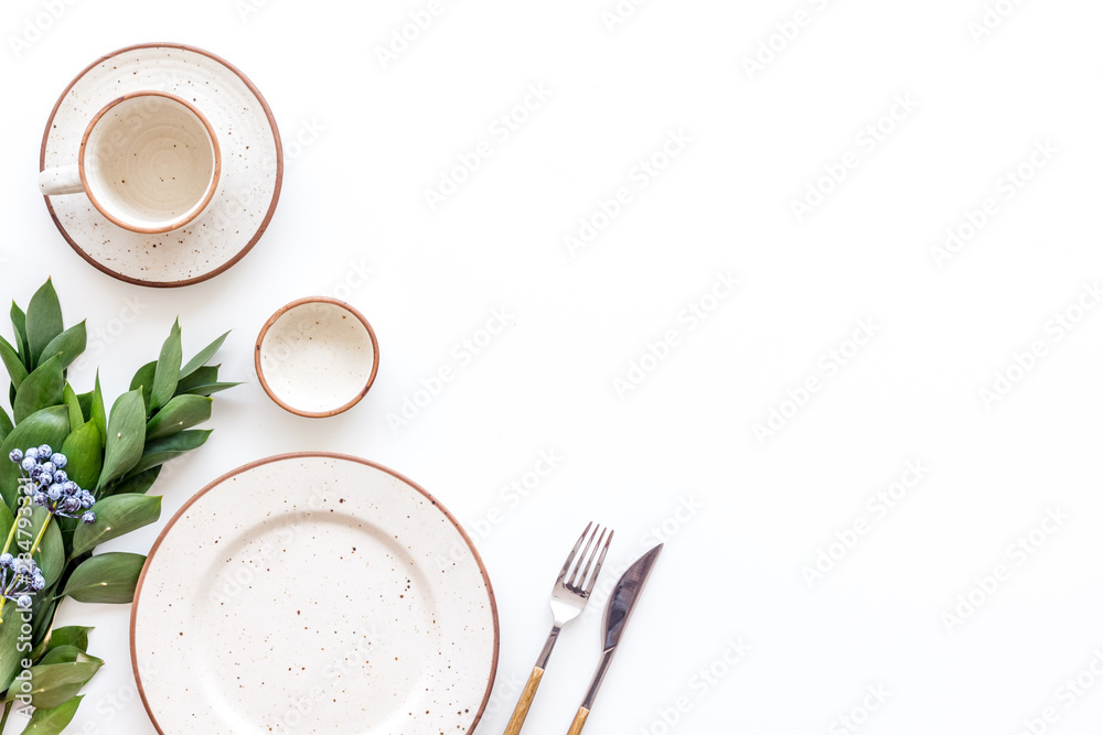 Elegant table setting with plates and tableware on white background top  view mock up Stock Photo | Adobe Stock