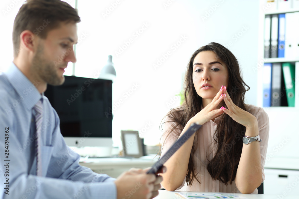 Obraz premium Portrait of businesswoman waiting decision about signing international statement. Beautiful woman discussing conditions of contract. Business concept. Blurred background