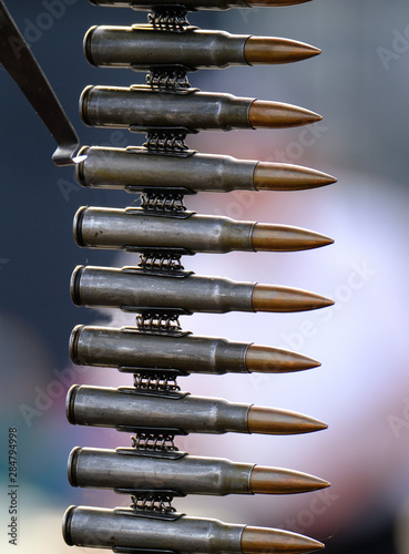 7.92mm mauser rifle calibre bullets linked for machine gun use. photo