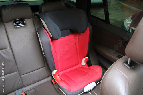 Child seat in the car. For safe transportation of children.