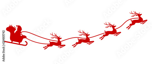 Santa Claus with sled and reindeers
