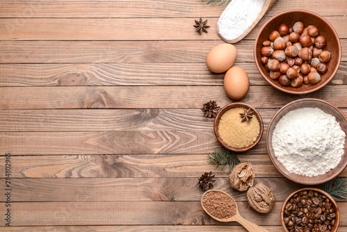 Ingredients for Christmas pie on wooden background