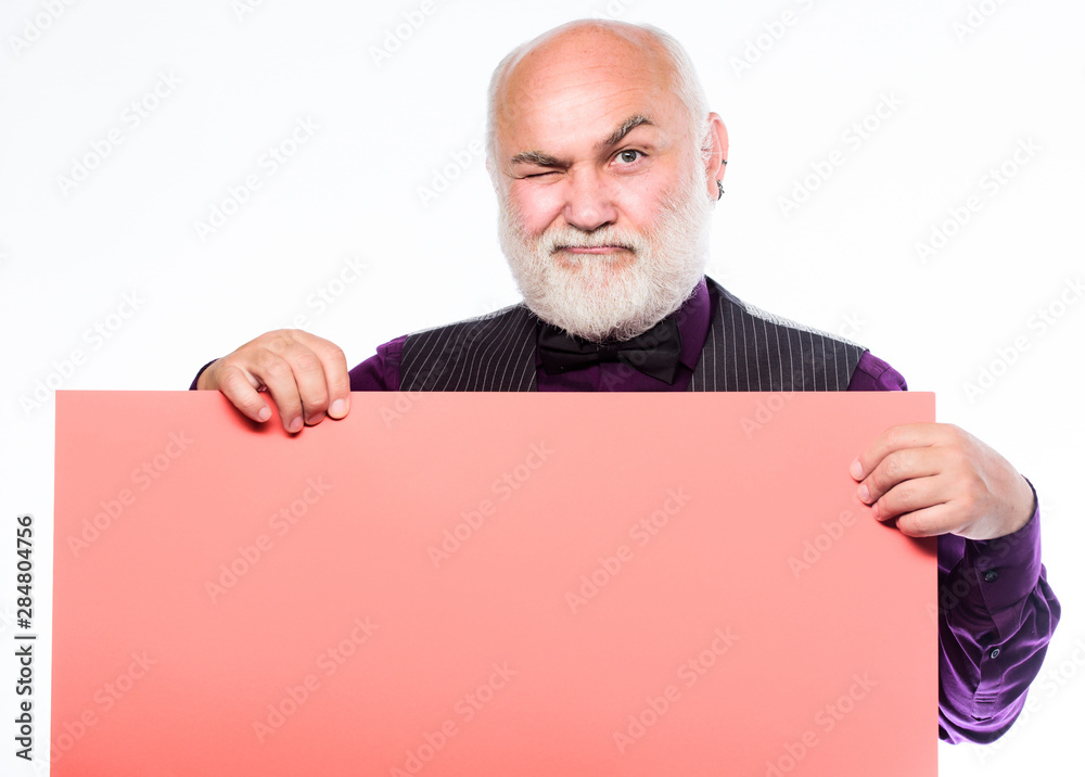 Elderly people. Senior holding blank sign board and looking at camera. Man bold head and gray beard hold poster for advertisement copy space. Senior means experienced. Senior man recommend something Elderly people. Senior holding blank sign board and looking at camera. Man bold head and gray beard hold poster for advertisement copy space. Senior means experienced. Senior man recommend something