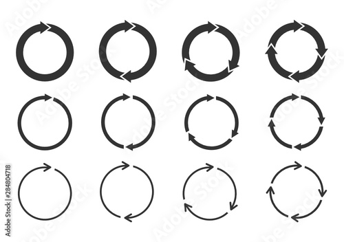 Set of circle arrows rotating on white background. Refresh, reload, recycle, loop rotation sign collection. Black circle arrows for infographics, web design. Vector illustration, flat style, clip art. photo