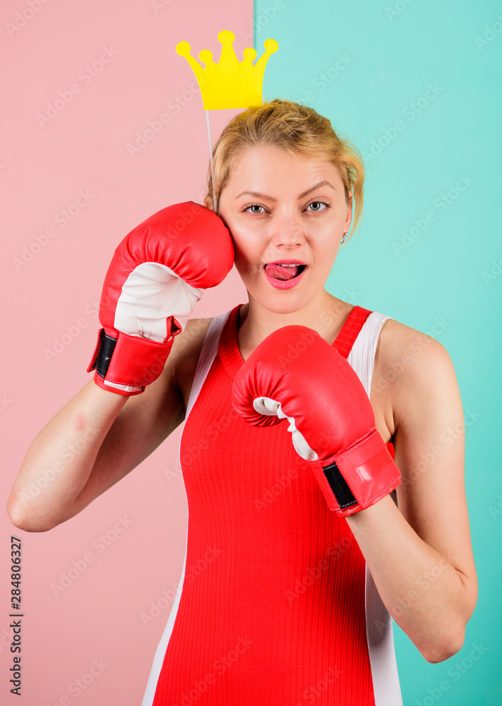 VIP gym. Woman boxing glove and crown symbol of princess. Queen of sport. Become best in boxing sport. Feminine tender blonde with queen crown wear boxing gloves. Fight for success. Fighting queen VIP gym. Woman boxing glove and crown symbol of princess. Queen of sport. Become best in boxing sport. Feminine tender blonde with queen crown wear boxing gloves. Fight for success. Fighting queen