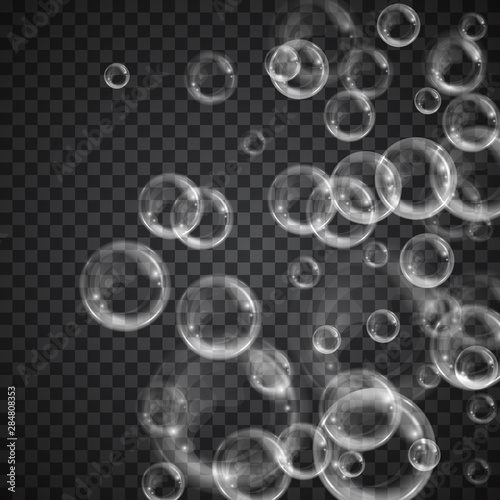 Realistic floating soap bubbles on transparent background. Design element for advertising booklet, flyer or poster