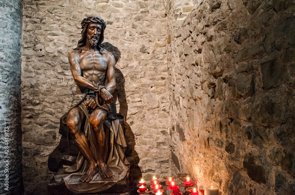 BRUGES - BELGIUM / 06.05.2015: A statue of Jesus in the Basilica of the Holy Blood in Bruges Belgium BRUGES - BELGIUM / 06.05.2015: A statue of Jesus in the Basilica of the Holy Blood in Bruges Belgium