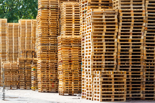 Large stacks of pallets outside photo