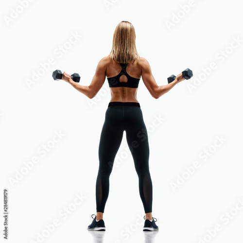 Beautiful Fitness Woman Exercise With Dumbbells