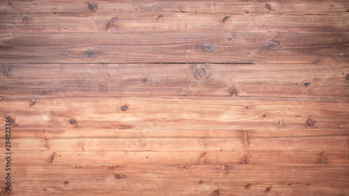 Close up of wall made of brown wood planks, Old wooden texture background