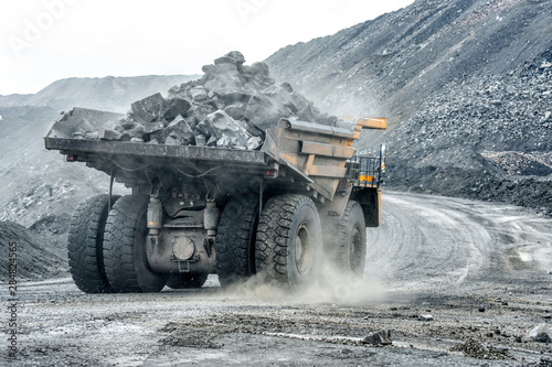 Large quarry dump truck. Transport industry. photo