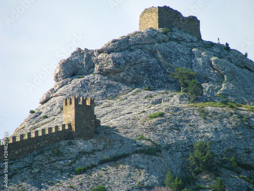 Crimea, ruins of an ancient Italian mountain fortress, impregnable stone walls photo