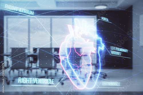Double exposure of heart hologram on conference room background. Concept of medical education