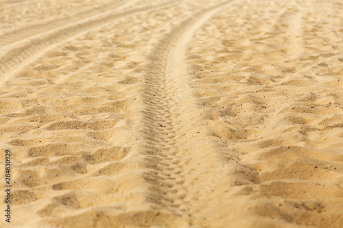 Wheel car mark on sand