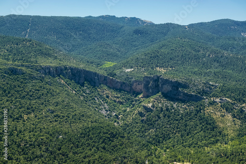 View from a viewpoint of the Mountain Range of Cazorla with detail of a ridge in the middle of several mountains. Photography taken in the Mountain Range of Cazorla Jaen, Spain