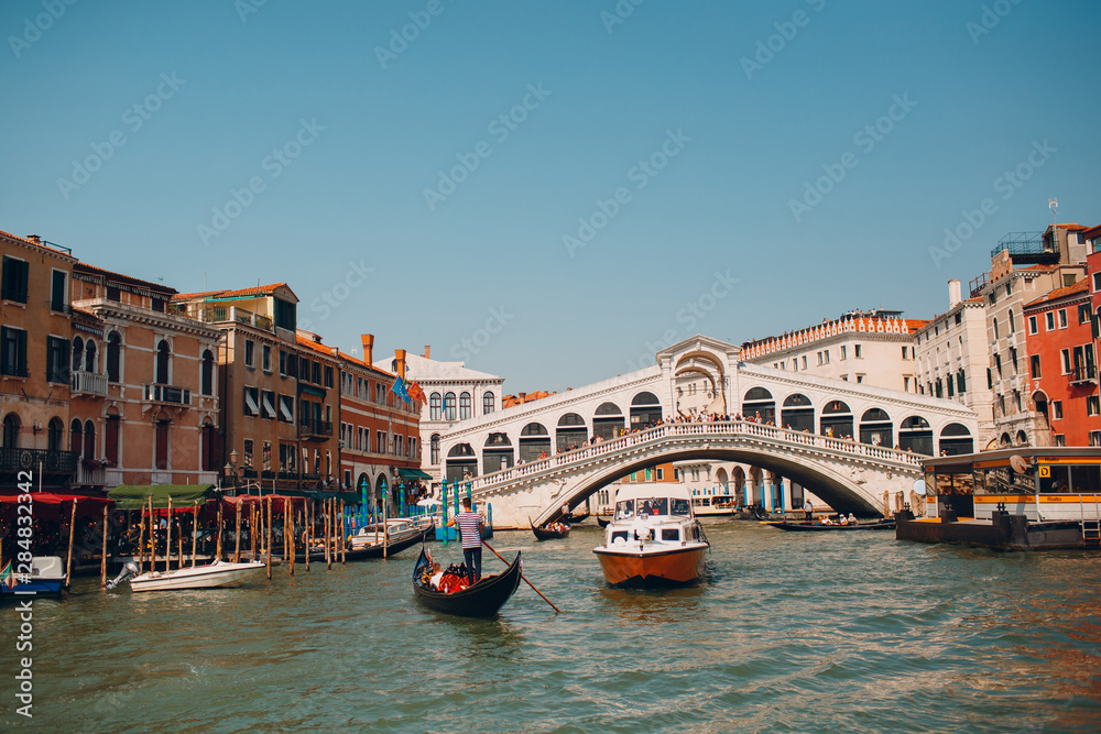 Rialto bridge and Grand Canal in Venice, Italy. View of Venice Grand Canal.