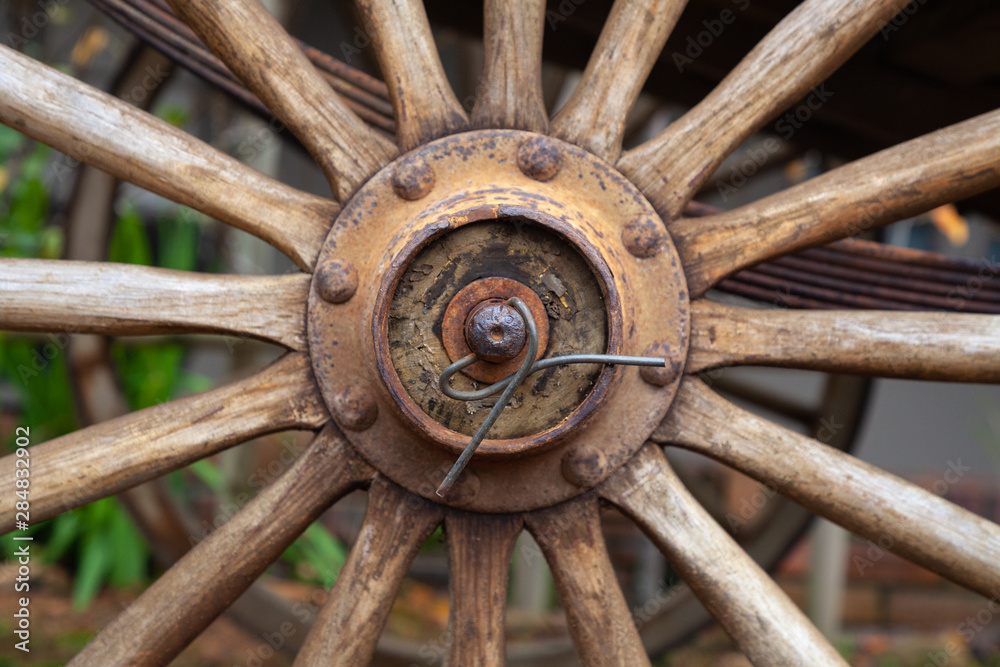 Old wagon wheel closeup